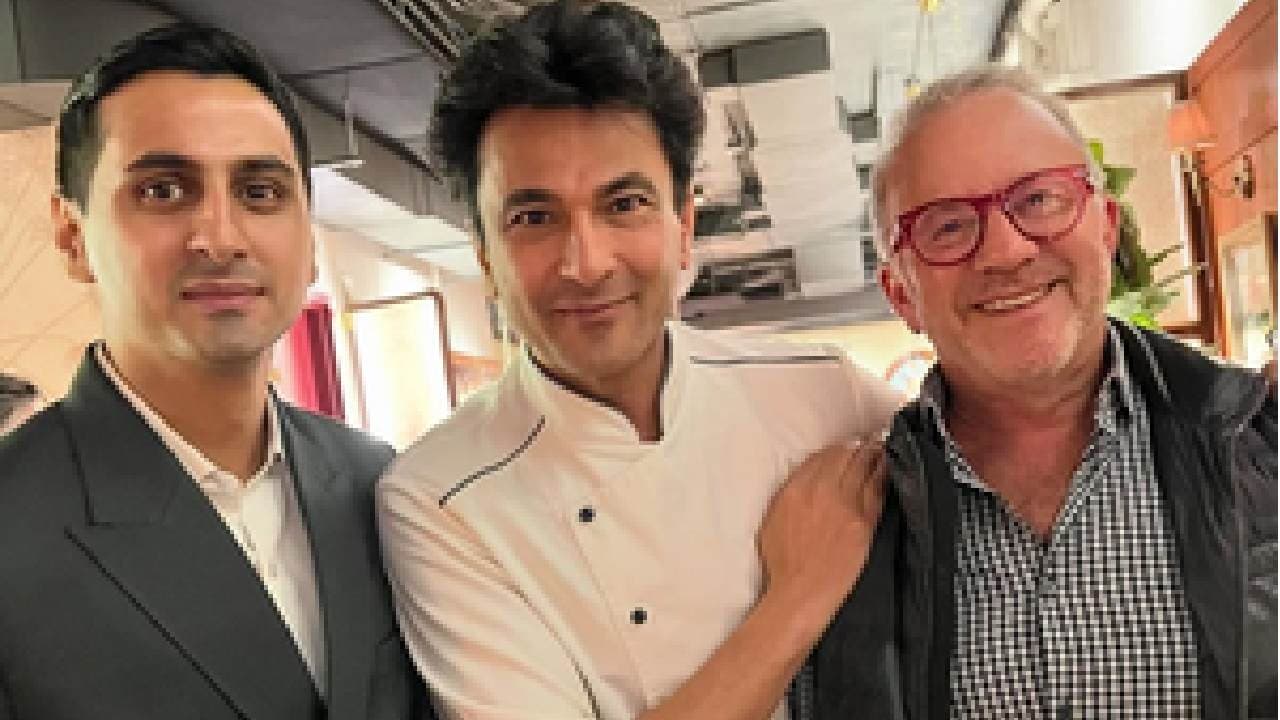 Vikas Khanna poses with 'kingmaker' Rick Smilow in his new NYC restaurant