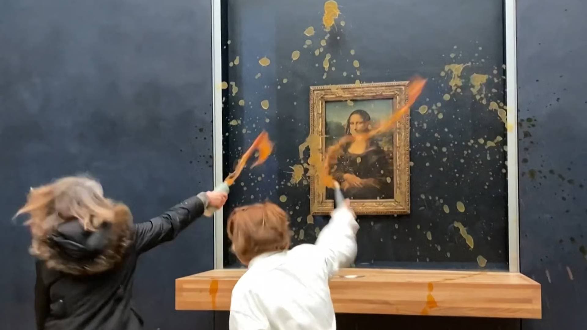 Protesters Throw Soup At Iconic Mona Lisa Painting In Paris